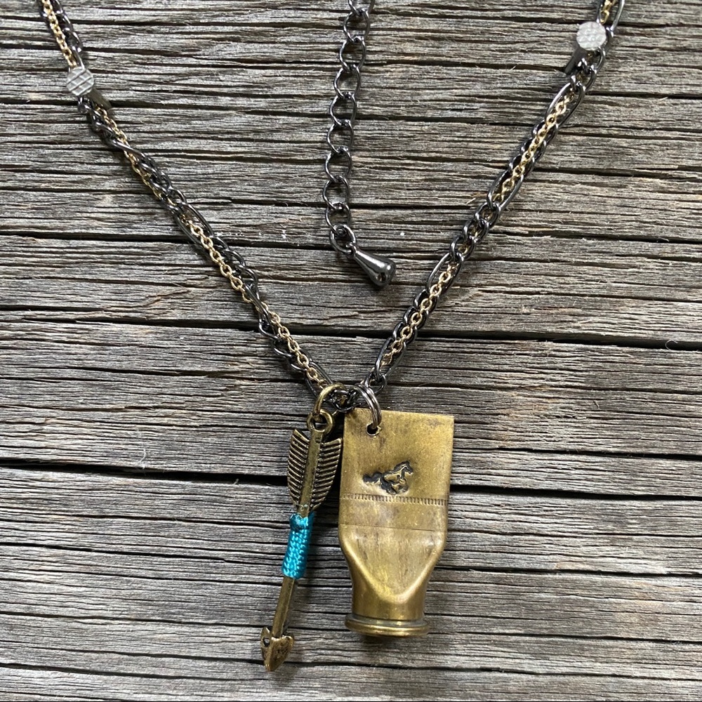 Bullet casing horse necklace
